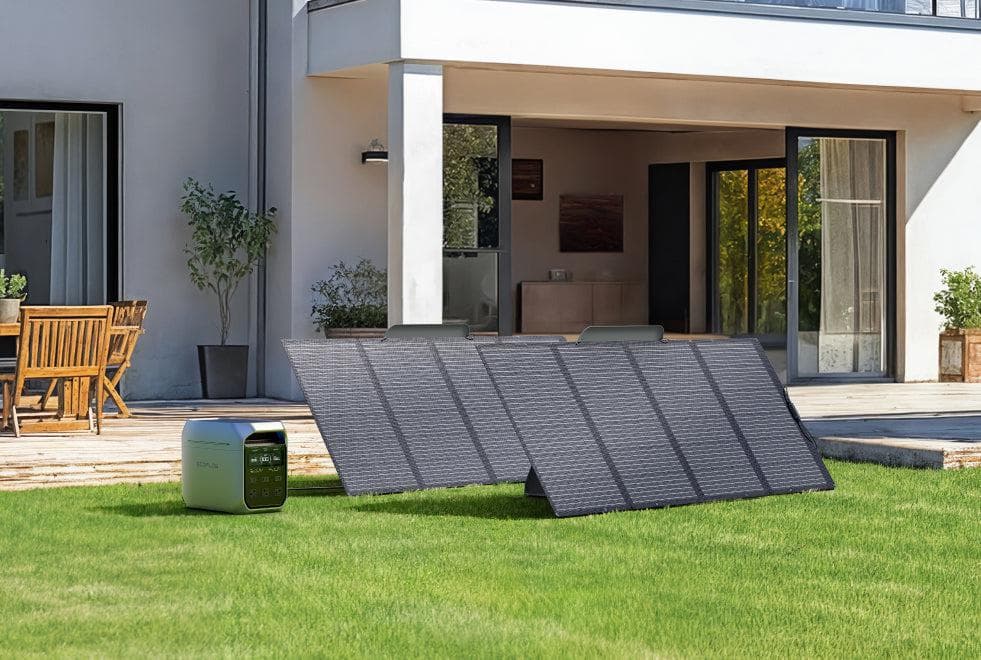 Portable solar charger in use outdoors, ideal for survival and emergency preparedness situations.